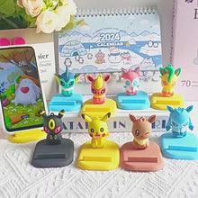 Load and play video in Gallery viewer, Pikachu, Evoli, Evoli Entwicklungen Handyständer in vielen Motiven und Farben
